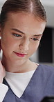 Night, nurse and woman in clinic with tablet, reading and confused for medical internship schedule. Late, person or healthcare intern walk in hospital with tech, research or doubt for online calendar