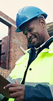 Black man, smile and clipboard on construction site for survey, review quote and checklist in low angle. Builder, notes or happy at worksite for inspection protocol, project policy or progress report