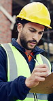 Man, writing or clipboard on construction site for survey, progress report or reading checklist. Engineer, notes or planning at worksite for compliance protocol, project inspection or review contract