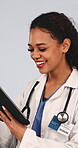 Healthcare, doctor and woman with tablet in studio, laughing and reading good news on health report. White background, medical professional and happy person with tech, online and review test results
