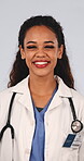 Doctor, face and woman with smile in studio, laugh and confident with medical career and healthcare. White background, health professional and happy person with pride, help and wellness services