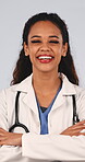 Doctor, face and happy woman with arms crossed in studio, laughing or confident with medical career. White background, healthcare professional and person with smile, health and wellness services