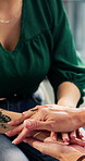 Therapy, women or holding hands for support, care or understanding with empathy in counseling session. Comfort, psychologist and patient in office for mental health, compassion and trauma healing