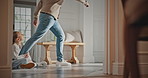 Legs, dad and kid with attachment in home for separation anxiety, dependence or sad for leaving. Clingy behavior, father and dragging child for physical connection, attention and fear of abandonment