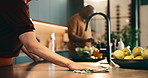 Cleaning, counter and couple in kitchen for cooking, meal prep and share tasks for marriage. Housework, helping and man with woman in home for disinfection, wipe and hygiene with food for dinner