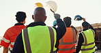 Architect, team and raised hand with hardhat for construction, safety and ppe for project success. Back, people or waving outdoor for awareness, appreciation and celebration of architecture milestone