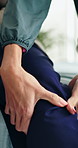 Hands, physiotherapist and people with knee pain, assessment and check for wellness at clinic. Patient, injury and muscle strain with inspection for legs, healthcare service or healing at hospital
