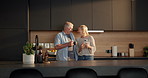 Coffee break, phone and elderly couple in home for morning, conversation or laugh together in kitchen. Love, smile and old man with woman for funny joke with social media, relax and chat in apartment