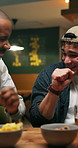 Customer, alcohol and men in pub, funny and confident for social gathering at night and laugh on break. Bar, consumer and person with smile on weekend, laugh or relax with friends or reunion on event