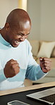 Excited, man and good news on laptop in home office, online and celebration for article publication. Black person, remote work and writer with positive feedback, fist pump and achievement in house