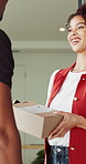 Box, door and delivery man with woman by home for ecommerce, online order or purchase with logistics. Happy, parcel and courier with female customer for cardboard package by house for distribution.