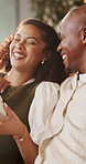 Happy, laughing and black couple with tablet in home for comedy, online entertainment or app. Man, woman or bonding with smile or technology for funny joke, humor or subscription together in house