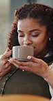 Smell, woman and coffee in home with aroma, caffeine scent and calm morning for stress relief. Thinking, person and inhale at house with beverage, fragrance and nostalgia memory for weekend break