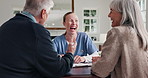 Consultation, home and nurse with senior people for medical diagnosis or treatment planning. Laugh, discussion and healthcare worker with elderly patients for results on clipboard in checkup at house