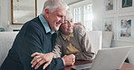 Hug, laptop and senior people in home with planning retirement funds, savings or investment payout. Couple, technology and elderly man with woman on computer for financial growth in apartment.