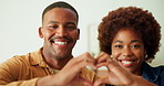 Face, happy and heart hands with couple kiss in home for marriage connection, bonding and romance. Smile, black people and love emoji in apartment with affection, healthy relationship and support