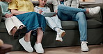 Legs, parents and children with tablet in family home, streaming movie and bonding together on weekend. Technology, mother and father with kids in living room to relax, entertainment and watch film