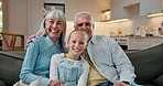 Face, child and smile with grandparents in home for care, support or connection with generations. Girl, portrait and hug with senior people in living room for family bonding, love and granddaughter