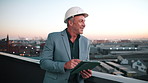 Construction, tablet and thinking with architect on rooftop for city planning or project management. App, hardhat and vision with mature man outdoor for property, real estate or urban development