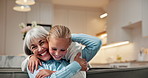 Face, grandmother and child in home with hug, smile and love for bonding together on weekend break. Happy, elderly woman and girl kid in lounge with embrace, family wellness and affection for care.
