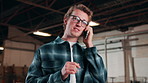 Phone call, carpenter and talk with man in warehouse for furniture order, client briefing and contact. Communication, joinery and manufacturing with person for inspection update and discussion