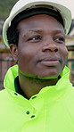 Happy, thinking and black man with idea for construction site, building project or renovation outdoor. City, engineer and person with reflection, planning or inspection for infrastructure development