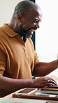 Winning, laptop and black man with fist pump for good news, promotion or business deal in home. Excited, male person or freelancer with smile for achievement, online investment or profit in house