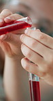 Science, learning and hands of children with liquid, creative experiment and development. Home, education and kids with test tubes, safety glasses and colors for research, chemistry and curiosity