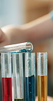 Science, test tubes and hands of children in home for creative lesson, development and curiosity. Education, house and kids with experiment, liquid and chemicals for learning, knowledge and research