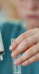 Hands, syringe and vial for homework with science for education, development and chemistry. Child, test tube and fluid with safety glasses, liquid and ppe for learning with school assignment at house