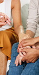 Holding hands, friends and women in home, support for compassion and empathy for grief. Apartment, gratitude and people in living room, conversation and sympathy with comfort, consoling and care