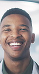 Face, doctor and black man in hospital, smile and career ambition with healthcare protocols. Employee, professional and person in clinic, happiness and about us for medical service and wellness