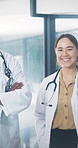 Face, doctors and people in hospital, smile and support for medical research, healthcare and teamwork. Employees, man and woman in clinic, happiness and cooperation for about us, funny and wellness