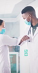 Doctors greeting, elbow and mask for covid safety with confused meeting, handshake and policy in clinic. Man, woman and compliance with respect, kindness and welcome with chat and hygiene protocols