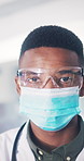 Face mask, doctor and black man in hospital, compliance or medical procedure for safety. African person, healthcare or professional in clinic, glasses for eye protection or ppe for hygiene protocols