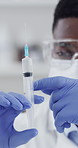Scientist, gloves and man with syringe in lab, biochemistry or sample analysis for drug development. Clinic, mask and black person with chemical, medical research and experiment for cancer cure
