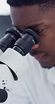Lab, scientist and man with microscope, study and disease inspection with plant sample or innovation. Clinic, observation and black person with equipment, quality control and agricultural research