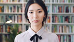 Serious, face and businesswoman with pride in library, knowledge and paralegal with job opportunity. Corporate, law assistant and Asian person with career growth, legal books and research for case