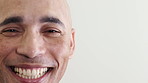 Face, man and laugh in closeup with oral hygiene, funny joke or satisfaction for veneers results. Space, happy person and humor with dentistry treatment for dental health, teeth whitening or wellness