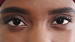 Eye, open and vision with woman in studio for optometry appointment or checkup. Healthcare, optical and eyesight with medical patient at ophthalmology assessment for visual correction or improvement