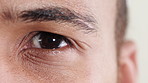 Face, man and eye care in closeup with eyesight, optometry exam and medical test for disease detection. Person, vision and ophthalmology evaluation for retina assessment, optical health and wellness.