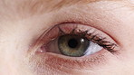 Eye, opening and optometry with person at clinic for healthcare appointment or checkup. Closeup, macro and vision with medical patient blinking at sight exam or test for ophthalmology assessment