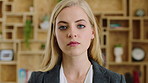 Woman, face and serious at office with confidence, pride and career at legal advisory company. Person, attorney or agent with job, portrait and consultant in workplace at law firm in New Zealand