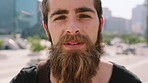 Breeze, commute and face with man in city as exchange student for learning or opportunity. College, university scholarship and windy with academic person outdoor in urban town for travel to campus