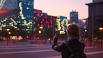 Picture, night and woman with phone in city, international student and study opportunity for post. Bokeh, late and person with photography for abroad travel blog, exchange programme or mobile in town
