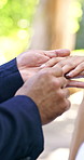 Hands, love and wedding ring with couple, marriage and bonding together with commitment. Diamond, jewelry and anniversary celebration with people, romance and relationship with loyalty and ceremony