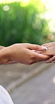 Hands, ceremony and engagement ring with couple, marriage and bonding together with commitment. Diamond, jewelry and anniversary celebration with people, romance and relationship with love or support