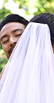 Marriage, hug and couple happy on wedding day with love, care and commitment to relationship. Bride, groom or people together for union outdoor in park with romance, connection and gratitude