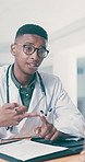 Doctor, talk and consultation in office with document, medical report and advice for treatment. Man, consulting or patient in hospital with paperwork, insurance application and checklist for symptoms