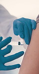 Doctor, healthcare or hands with vaccine injection for safety, protection booster or treatment. Needle, people or patient with virus immunity, prevention or medicine with flare in medical clinic